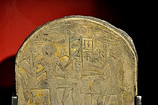Detail of funerary stela of Amenemhat. The name of God Amun was erased by Akhenaten's agents. Limestone, painted. From Egypt, early 18thh Dynasty. The Burrell Collection, Glasgow