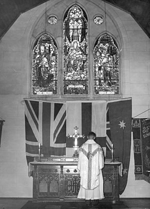 Reverend A. E. Loxton at the altar of St. Thomas' Church of England, Toowong, 1952 (4991490175)