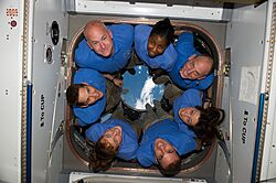 STS-131 crew members in ISS Cupola