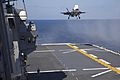 USMC F-35B conducting a vertical landing aboard the JS Izumo