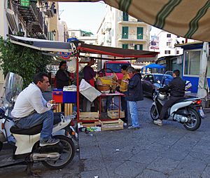 Pane ca meusa served streetside in a Palermo market