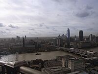 The emerging South Bank cluster as viewed from St Paul's Cathedral, October 2022. The two tallest towers here are One Blackfriars which was completed in 2018 at 163m and the South Bank Tower that was originally constructed in 1972 at 111m but was given an 11 storey height increase in 2017 to bring it up to 150m. There are several more towers planned for this cluster ranging from between 100m and 178.5m tall. There is also an emerging cluster at Elephant and Castle shown on the far left which includes notably, Strata SE1 and another emerging cluster in the distance on the right at Vauxhall/Nine Elms