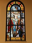 Stain glass of the Crucifixion, Bishop Wenski artistically added