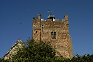 The tower of the church of St Mary, Harmondsworth, west Middlesex, July 2015
