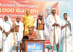 Trainer, motivator, author & keynote speaker ujjwal patni becomes mahatma gandhi and for 1000 gandhi event at sabarmati, ahmedabad, india with blessings of Muni Shri Tarunsagar ji, Guinness record event, october 2012.jpg