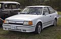 1990 Ford Escort GT in white, front left (Hershey 2019)