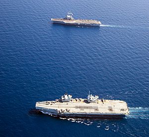 Aircraft carriers HMS Queen Elizabeth (R08) and Charles de Gaulle (R91) underway in the Mediterranean Sea on 3 June 2021 (210603-M-MS099-336)