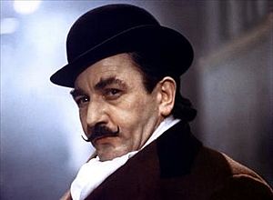 Albert Finney plays Poirot