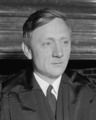Face detail, Douglas dons robes of Supreme Court Justice. Washington, D.C., April 17. William Orville Douglas, 40 year old successor to retired Justice Louis D. Brandeis, today donned the robes of an LCCN2016875459 (cropped)
