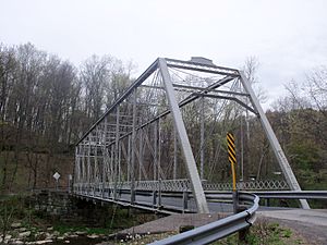 Grimms Bridge (1884) crosses the Little Beaver Creek east of Ohio State Route 170
