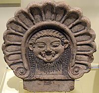 Roof ornament with Medusa's head. Etruscan, from Italy, 6th century BCE. National Museum of Scotland, Edinburgh