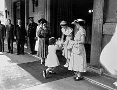 StateLibQld 1 104060 Presenting flowers to The Queen outside Brisbane City Hall in March 1954