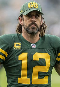 Green Bay Packers quarterback Brett Favre throws the football to the  sidelines after throwing a complete pass in the fourth quarter against the  St. Louis Rams, eclipsing Dan Marino to become the