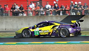 Ferrari 488 GTE EVO - Felipe Fraga, Sam Bird & Shane van Gisbergen approaching Dunlop Chicane at the 2022 Le Mans (53489774027)