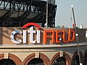 Citi Field logo being installed on the stadium