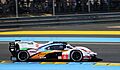 Porsche 963 Hybrid - Kevin Estre, Andre Lotterer & Laurens Vanthoor enters Tertre Rouge at the 2023 Le Mans (53470244984)