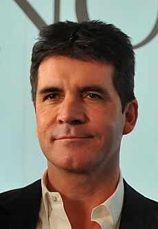 Simon Cowell with a Norwood service user (cropped)