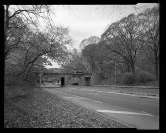 Van Cortlandt Park equestrian path overpass, with former Putnam Railroad bridge in background, looking west. - Henry Hudson Parkway, Extending 11.2 miles from West 72nd Street to Bronx HAER NY-334-92