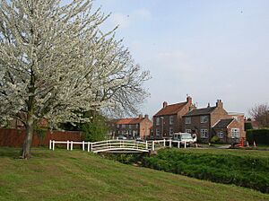 Village green and beck, Wilberfoss