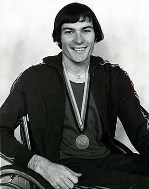 Xxxx72 - Ray Barrett with Paralympic bronze medal - 3b - scan.jpg