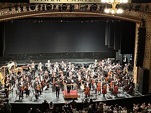 Augustin Hadelich at end of performance of Violin Concerto in D major with Xian Zhang and the New Jersey Symphony
