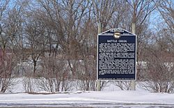 Historical marker at northern outskirts of Battle Creek, describing the 1859 events for which the creek and the city were named