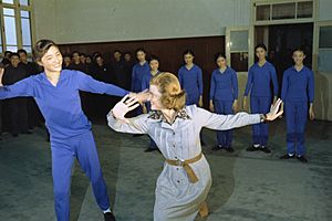 First Lady Betty Ford Shares a Dance Move with One of the Students while Touring the Central May 7th College of Art in Peking, People's Republic of China - NARA - 7062593