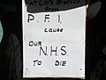 PFI Protest placard