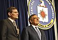 Secretary of Defense Leon E. Panetta stands with Michael Morell, acting director of the CIA, as a citation is read in Morell's homor on stage during one final visit to the CIA