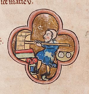 Baker baking bread in an oven - miniature in a 13th century psalter