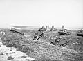 Bren gun carriers of the 9th Battalion, Gordon Highlanders pass between the prehistoric standing stones of the Ring of Brodgar on Orkney, 18 June 1941. H10589