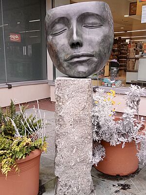 Face with closed eyes, Swan Centre, Leatherhead