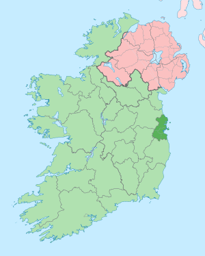 map showing County Dublin as a small area of darker green on the east coast within the lighter green background of Ireland and Northern Ireland in pink