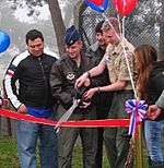 Joshua Kent, with the help of Col. Jay Silveria cut the ribbon and Carlos Mencia Kid Rock and Jessie James cut the ribbon to open new fitness stations at RAF Lakenheath.jpg