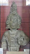 Maya maize god statue