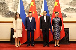 President Rodrigo Roa Duterte and his long-time partner Cielito “Honeylet” Avanceña greet People’s Republic of China State Council Premier Li Keqiang’s wife Cheng Hong