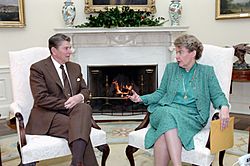 President Ronald Reagan meeting with Jeane Kirkpatrick in the Oval Office