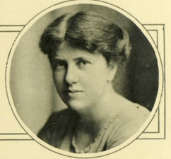 A photograph of the head and shoulders of a woman