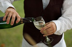 Waiter pouring Zardetto sparkling Prosecco