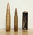 7.62x51 and 5.56x45 bullet cartridges compared to AA battery