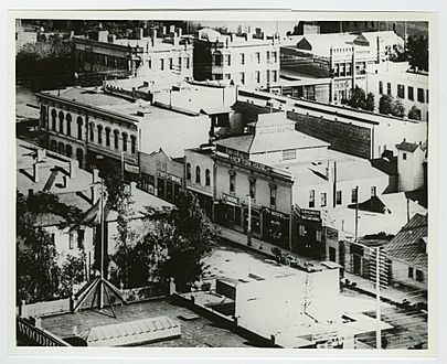 C. 1887 view looking east along south side of 3rd Street incl. former New York Brewery, towards Main (across top). Back left The Thom Block. Back right - Olmsted & Wales bookstore in Panorama Building