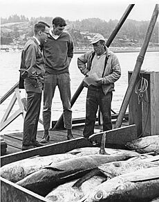 Dan Panshin and Bob Jacobson talk to an albacore tuna fisherman, 1965 (5857916261)