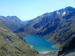 An alpine lake flanked by mountains