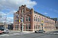 Many buildings in the historic district resembled factories or mills (27798510592)