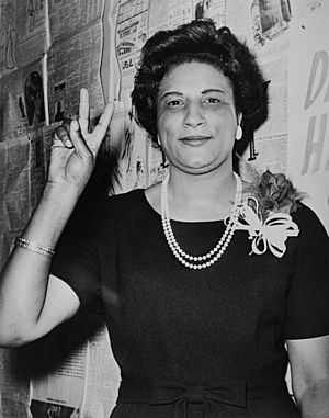 Mrs. Constance B. Motley, first woman Senator, 21st Senatorial District, N.Y., raising hand in V sign.jpg