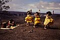 Native Hawaiians performing a dance with a musician playing a Ipu Heke at Hawai'i Volcanoes National Park. (75fded1195fc4b79907f5cbea4b470b7)