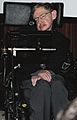 Stephen Hawking sitting in his wheelchair inside