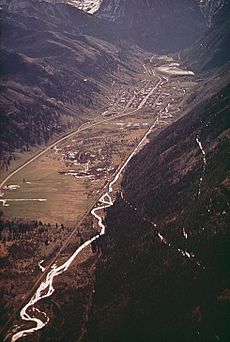 AERIAL VIEW OF TELLURIDE SHOWING NEWLY-CUT SKI TRAILS (IN RIGHT FOREGROUND - NARA - 543746