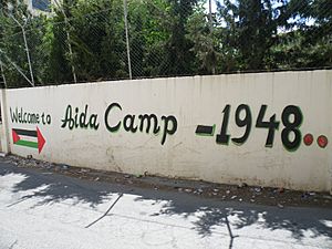 Mural at the entrance to Aida camp