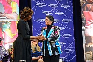 First Lady Michelle Obama Embraces 2014 IWOC Awardee Oinikhol Bobonazarova of Tajikistan (12935687743)